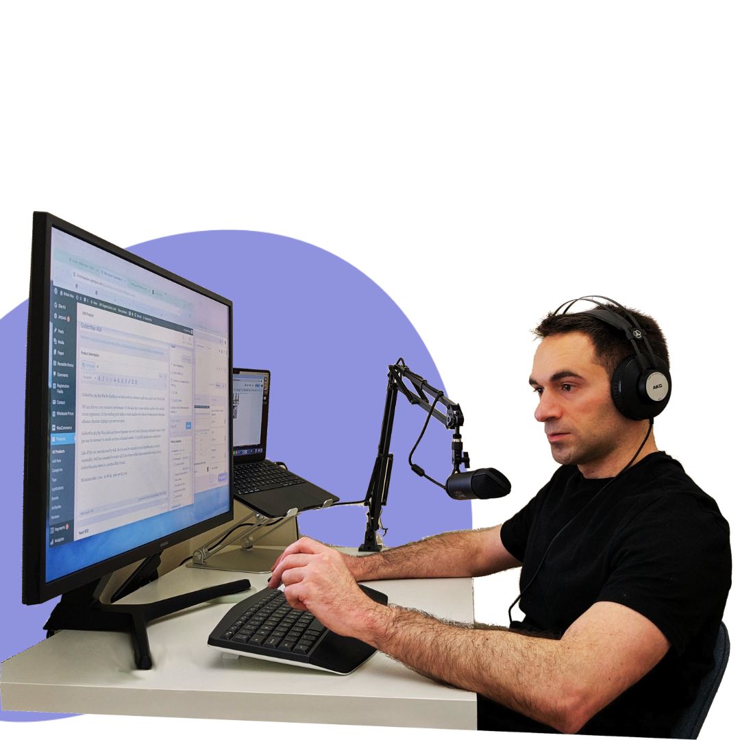Pietro, e-commerce expert sitting in front of his computer wearing a headset